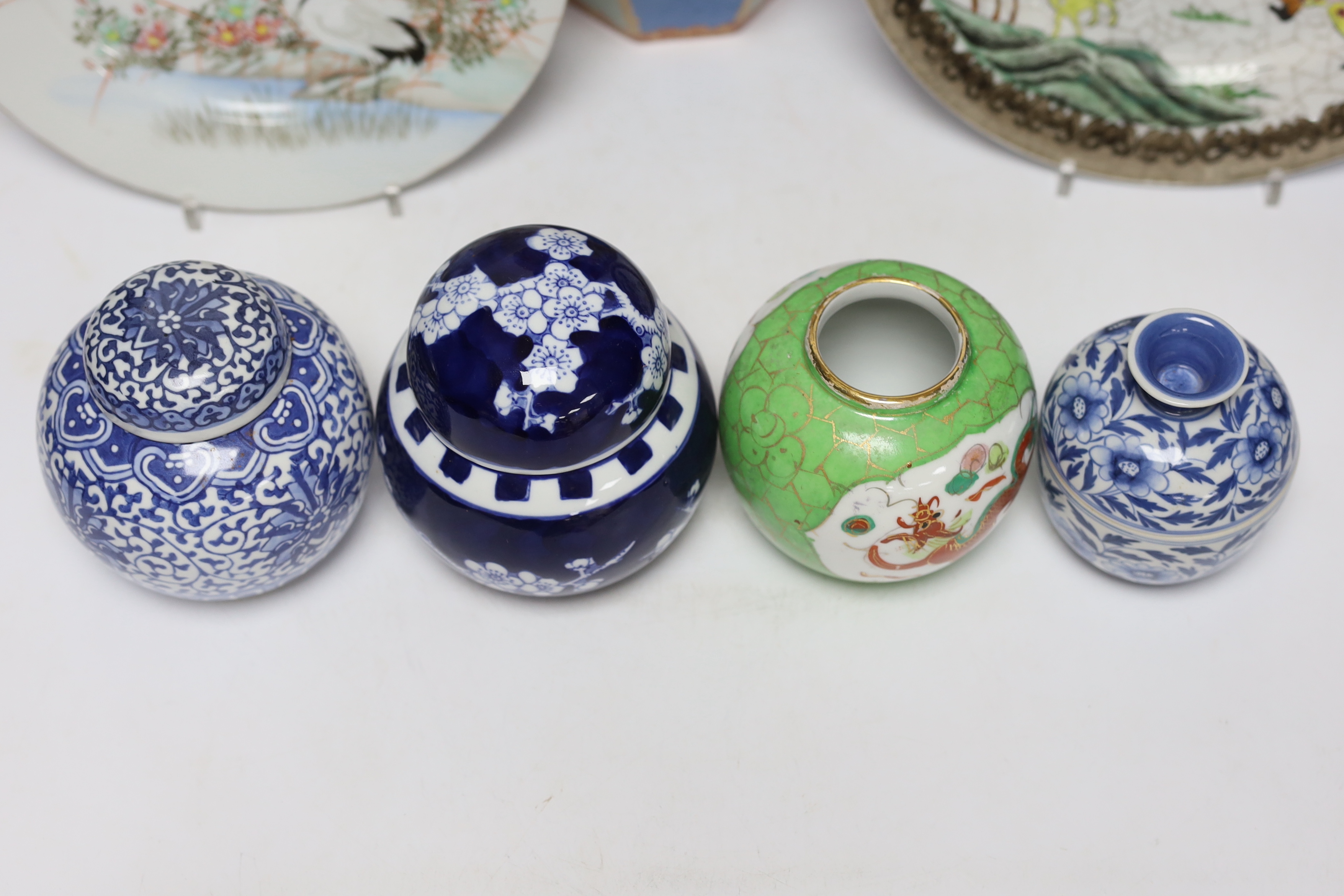 A group of Japanese and Chinese porcelain including an 18th century Chinese export dish, tallest 36cm
